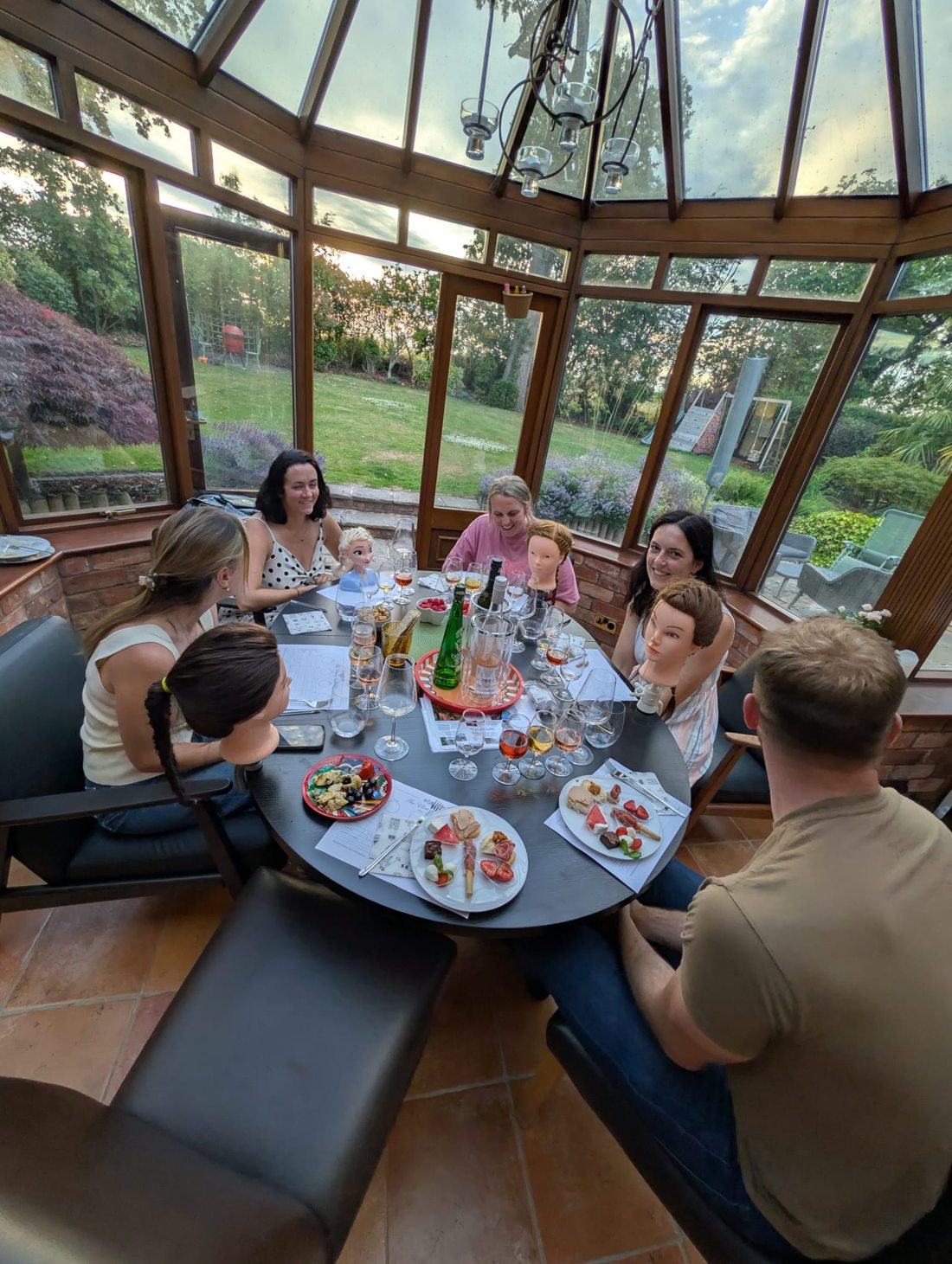 Guests enjoying a Sip and Braid session