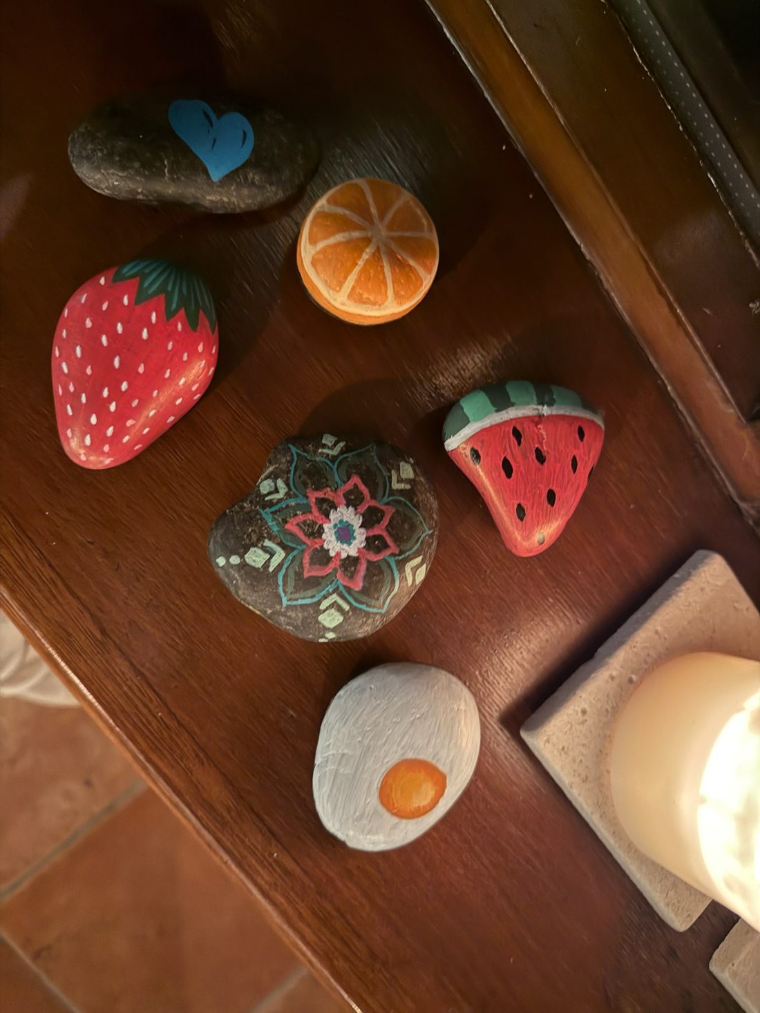 Colourful hand-painted rocks